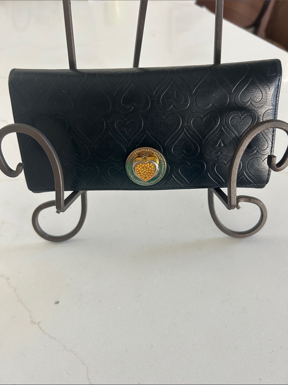 Lovcat black heart embossed leather tri-fold wallet with rhinestone heart clasp